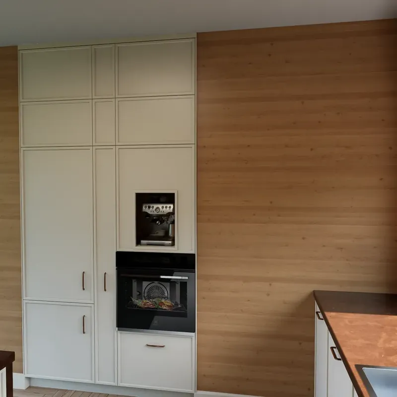 Render of tall cream units with a built-in oven and coffee machine niche against a timber wall